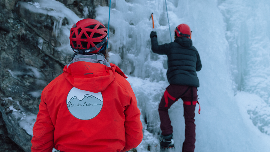 belayer and ice climber